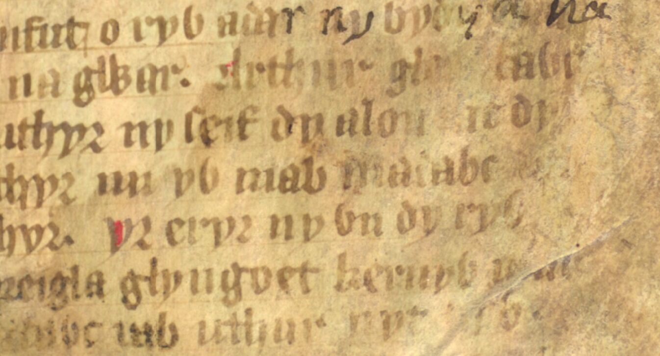 Jesus College MS 20, folio 1r, mostrando a Eliwlod llamándose hijo de «Madawc» (final de la línea central)