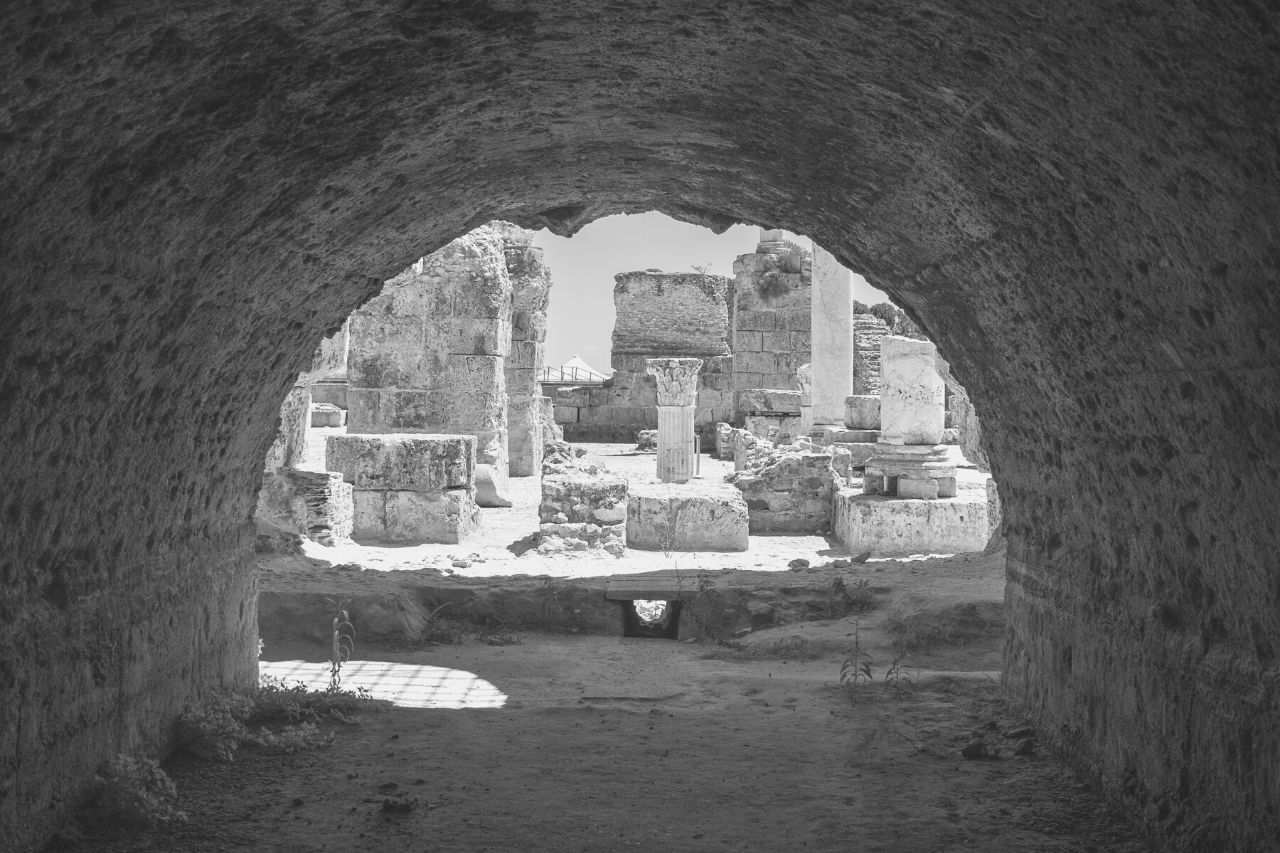 View through arch to archaeological site of Carthage